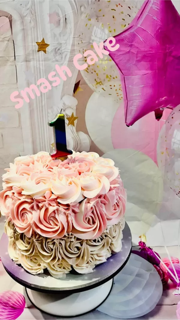 pink and white and taupe smash cake